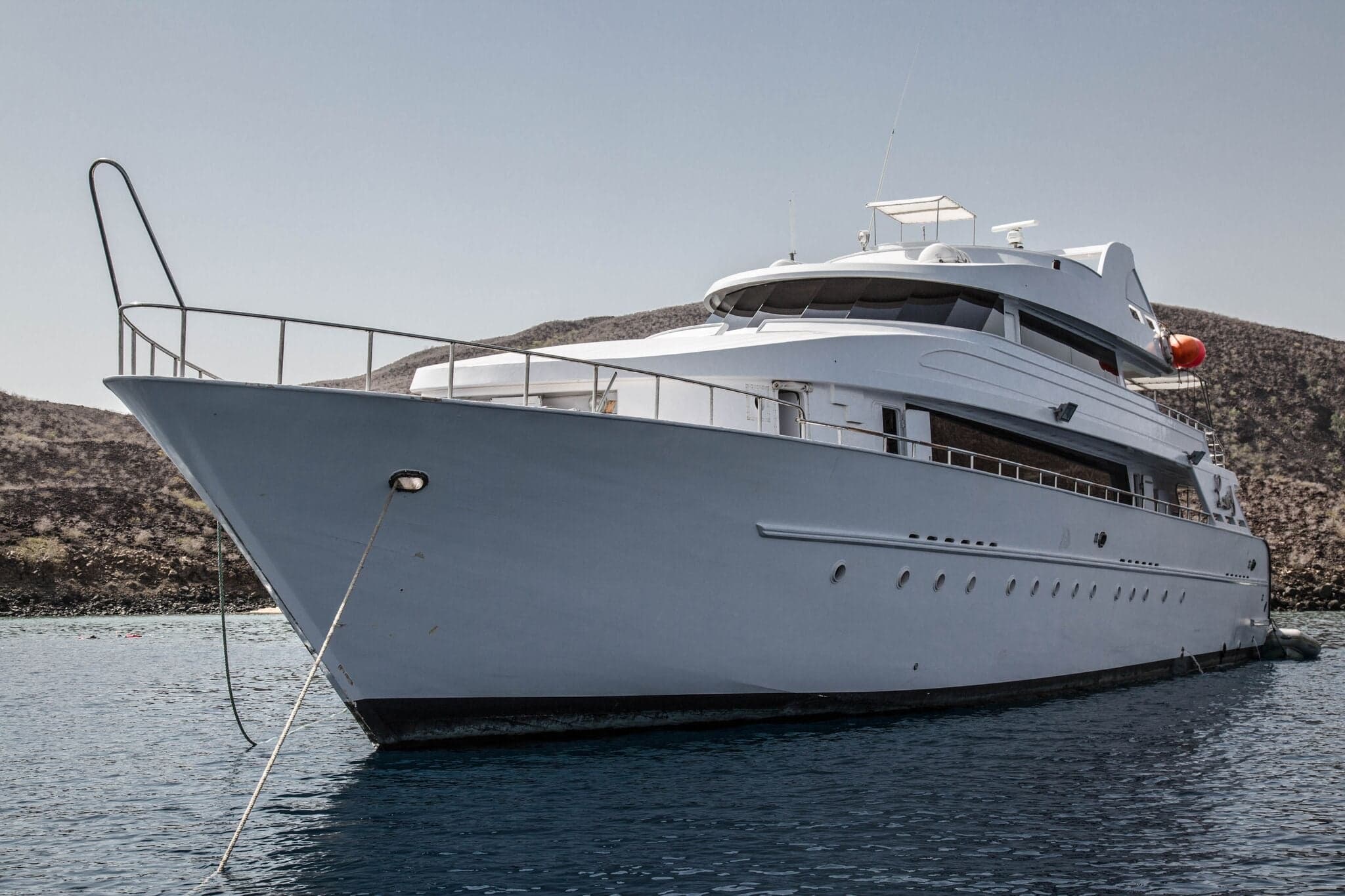 Lucy explores Djibouti’s remote sites, diving near volcanic ridges and coral-covered slopes where whale sharks and playful dolphins frequently make appearances