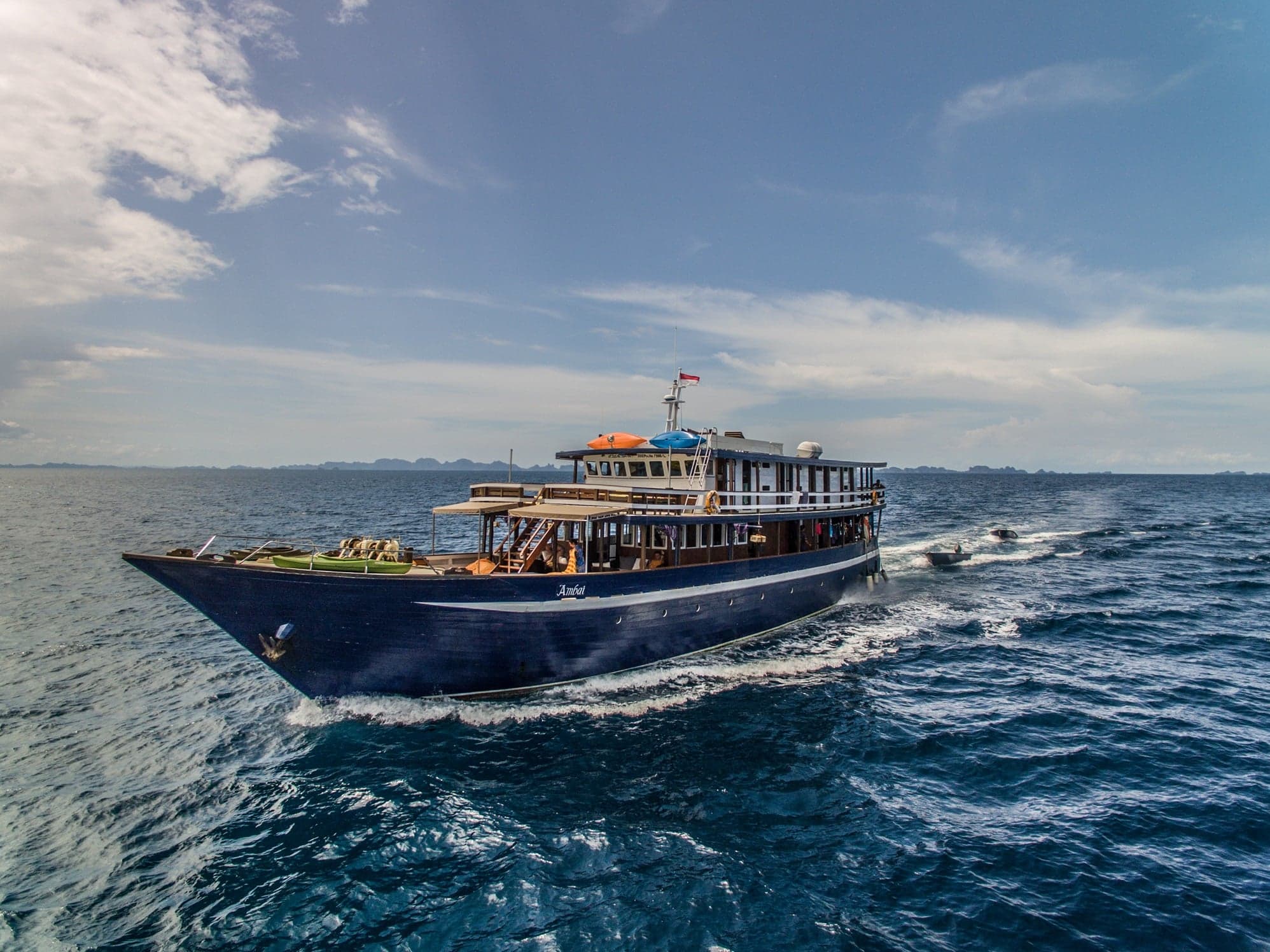 Ambai brings photographers and experienced divers into the heart of Raja Ampat and Banda. Think manta rays, pygmy seahorses, and kaleidoscopic soft coral walls