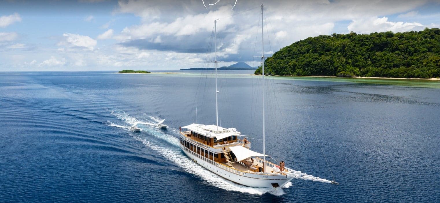 Fenides sails through Raja Ampat and the Banda Sea, offering access to schooling hammerheads, manta rays, and macro life across remote coral-covered slopes