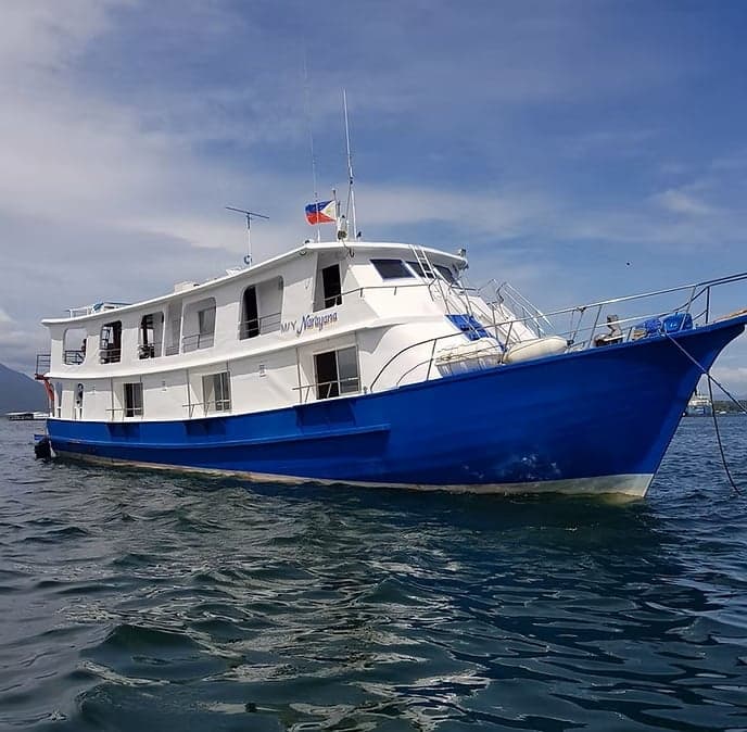 Experience Tubbataha Reef aboard the Narayana liveaboard, one of the few vessels with seasonal permits. Enjoy up to four dives daily, Filipino-Western cuisine, and comfortable twin or double cabins