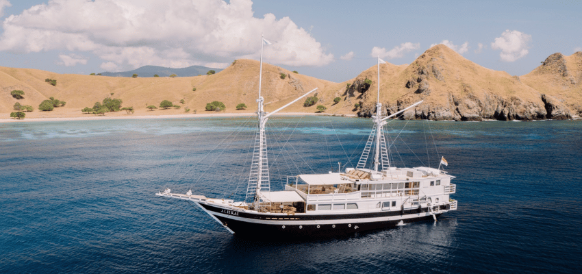 Aliikai Liveaboard Indonesia Elegant lines of the luxury liveaboard Aliikai sailing between remote islands in Indonesia.