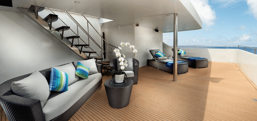 sundeck Gaia Love Liveaboard, Indonesia Luxury upper deck bar and outdoor jacuzzi lounge area on the Gaia Love liveaboard yacht.