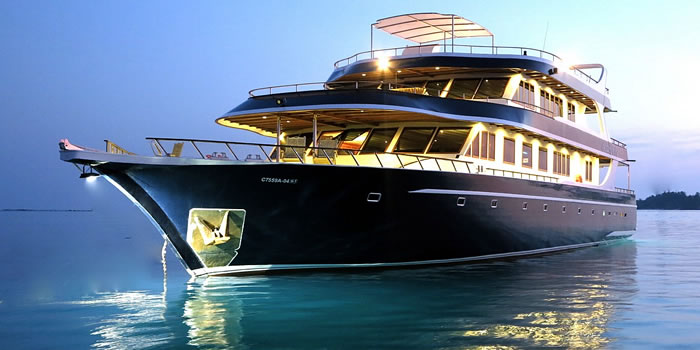 Luxury defines Ocean Divine, cruising the Maldives with premium dining, personalized service, and dive sites packed with reef sharks, turtles, and schooling fish