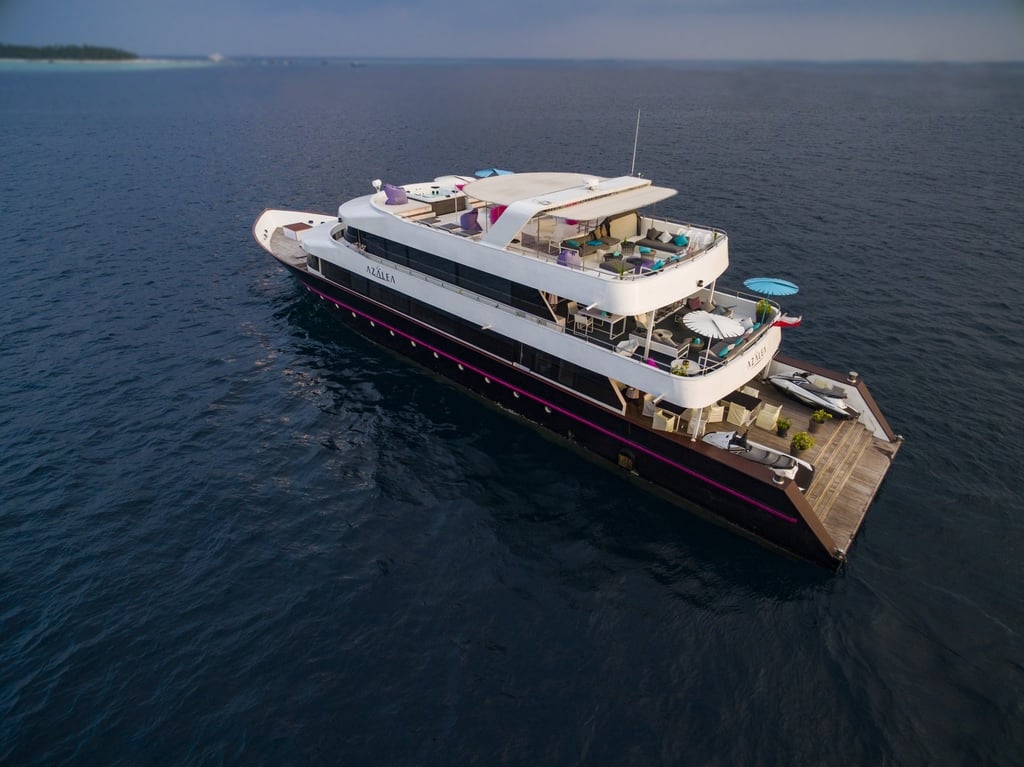 A luxury yacht with sleek lines and premium service, Azalea cruises through the Maldives' central atolls. Dive sites offer encounters with whale sharks, reef sharks, and coral-covered pinnacles