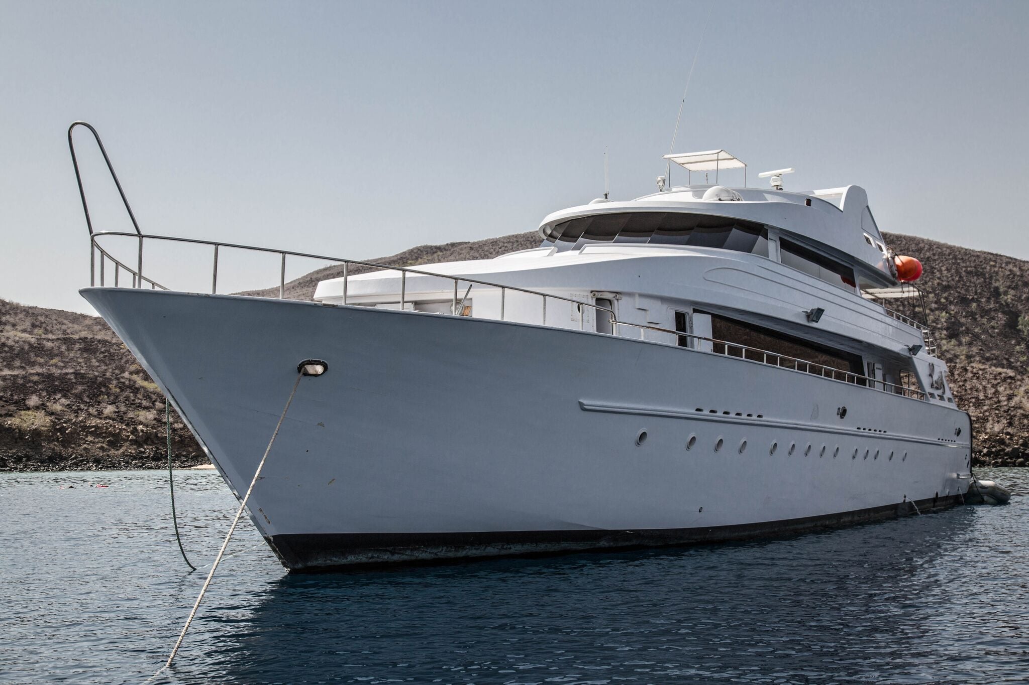 Lucy explores Djibouti’s remote sites, diving near volcanic ridges and coral-covered slopes where whale sharks and playful dolphins frequently make appearances