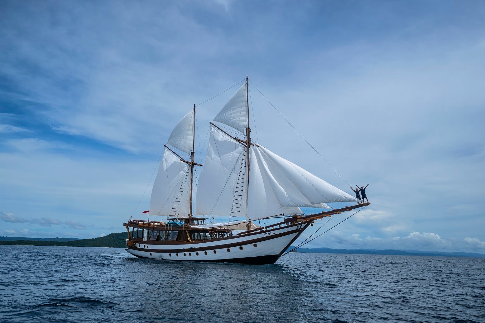 A handcrafted phinisi with modern comfort, Majik sails through Raja Ampat and Komodo. Expect manta rays at Manta Sandy, macro life in Misool, and sunsets from the upper deck