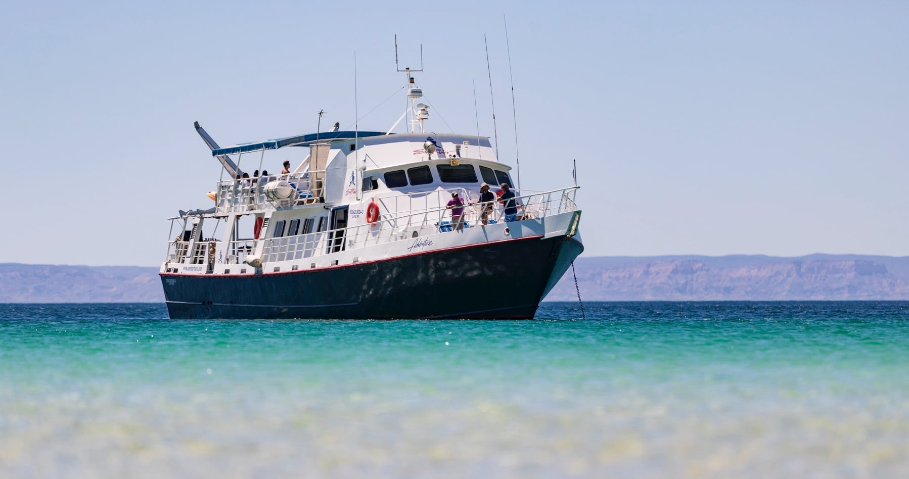 Adventure liveaboard heads to the remote Socorro Islands for unforgettable dives with giant mantas, playful dolphins, and schooling scalloped hammerheads in pelagic-rich waters