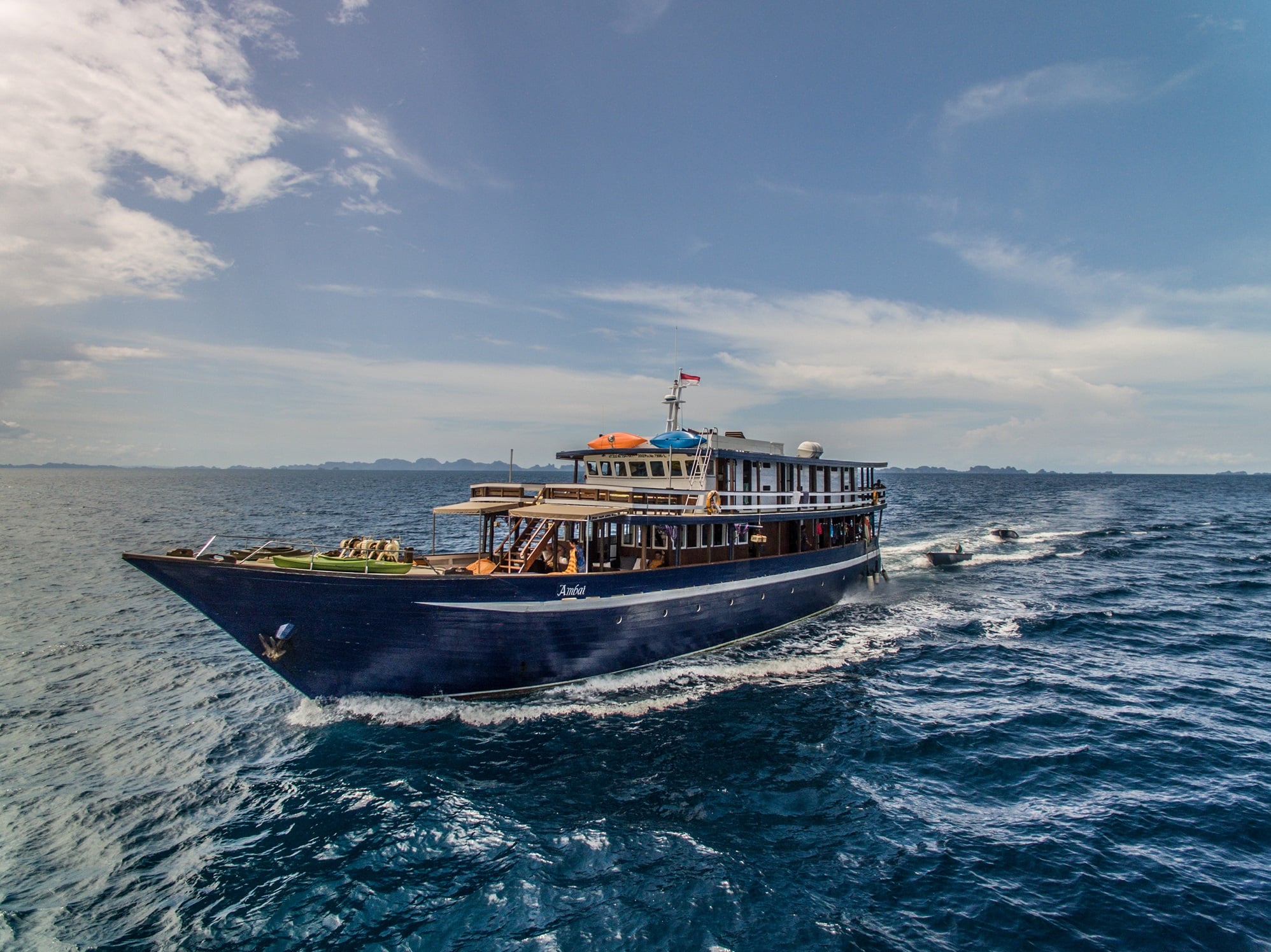 Ambai brings photographers and experienced divers into the heart of Raja Ampat and Banda. Think manta rays, pygmy seahorses, and kaleidoscopic soft coral walls