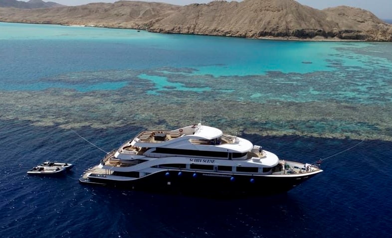 Scuba Scene is a 48.5m Red Sea liveaboard offering diving safaris for up to 28 guests. Enjoy spacious cabins with ocean views, a large camera table, and a well-equipped dive deck with rinse tanks and dryers