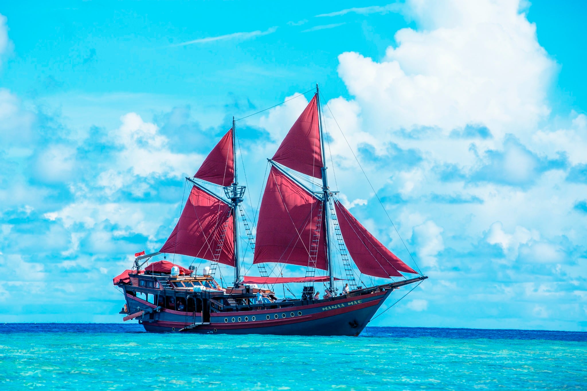 Sleek and stylish, Mantamae offers luxury sailing through the Coral Triangle. Manta Alley, Castle Rock, and soft coral seamounts headline its varied routes