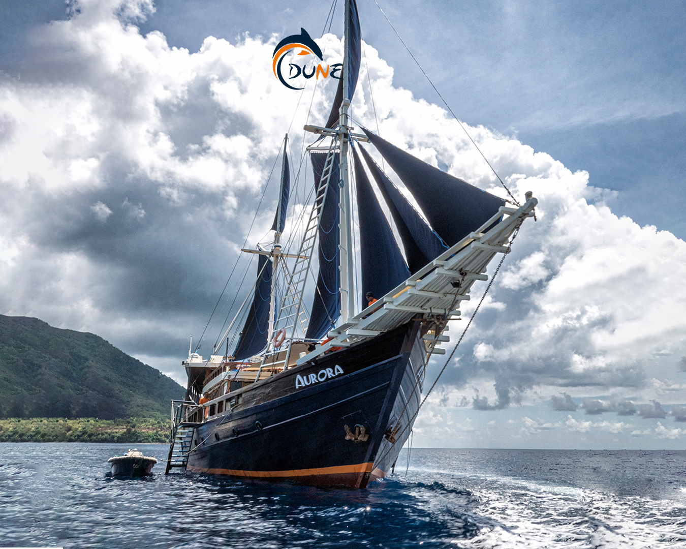 Aurora, a traditional phinisi, offers diving adventures in Indonesia's hotspots such as Komodo and Raja Ampat, known for encounters with manta rays, sharks, and vibrant coral gardens