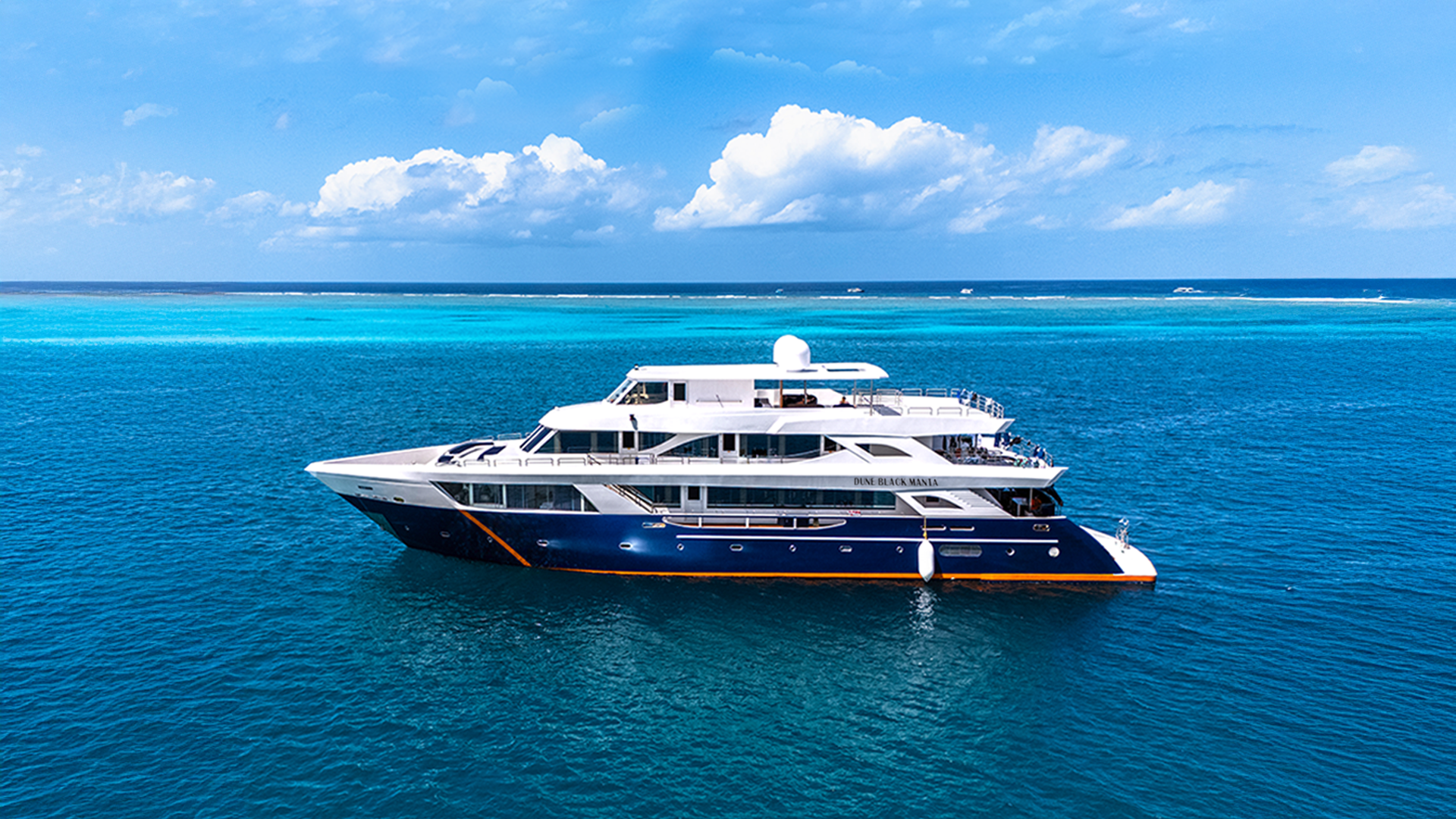 Black Manta yacht travels through the central atolls of the Maldives, visiting sites like Fish Head and Kandooma Thila, home to grey reef sharks, eagle rays, and schools of snapper