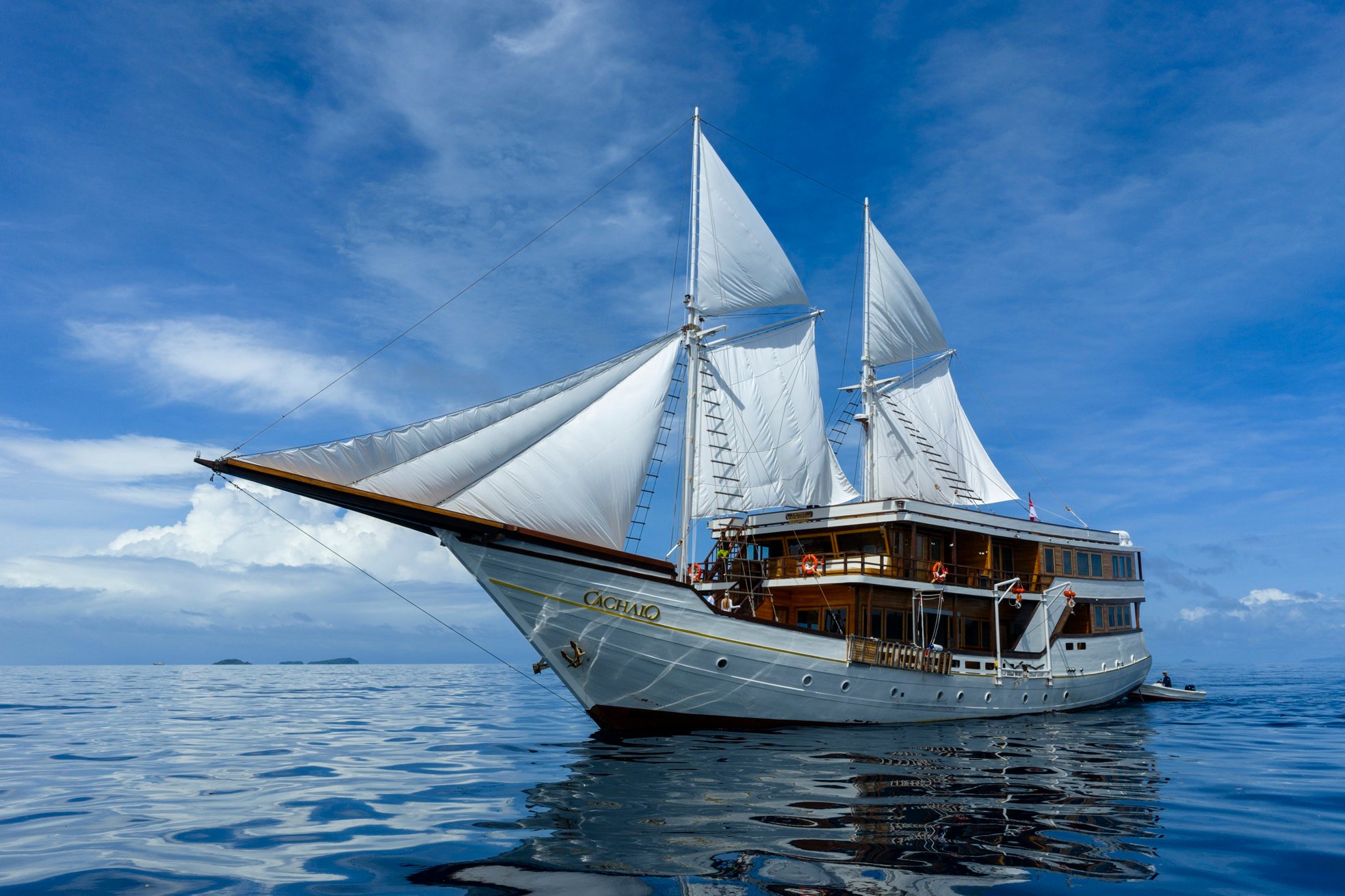 Cachalo is a 51-metre luxury Phinisi crafted in South Sulawesi, Indonesia, using traditional boatbuilding techniques with reinforced ironwood and natural teak. Built over two years, the ve...