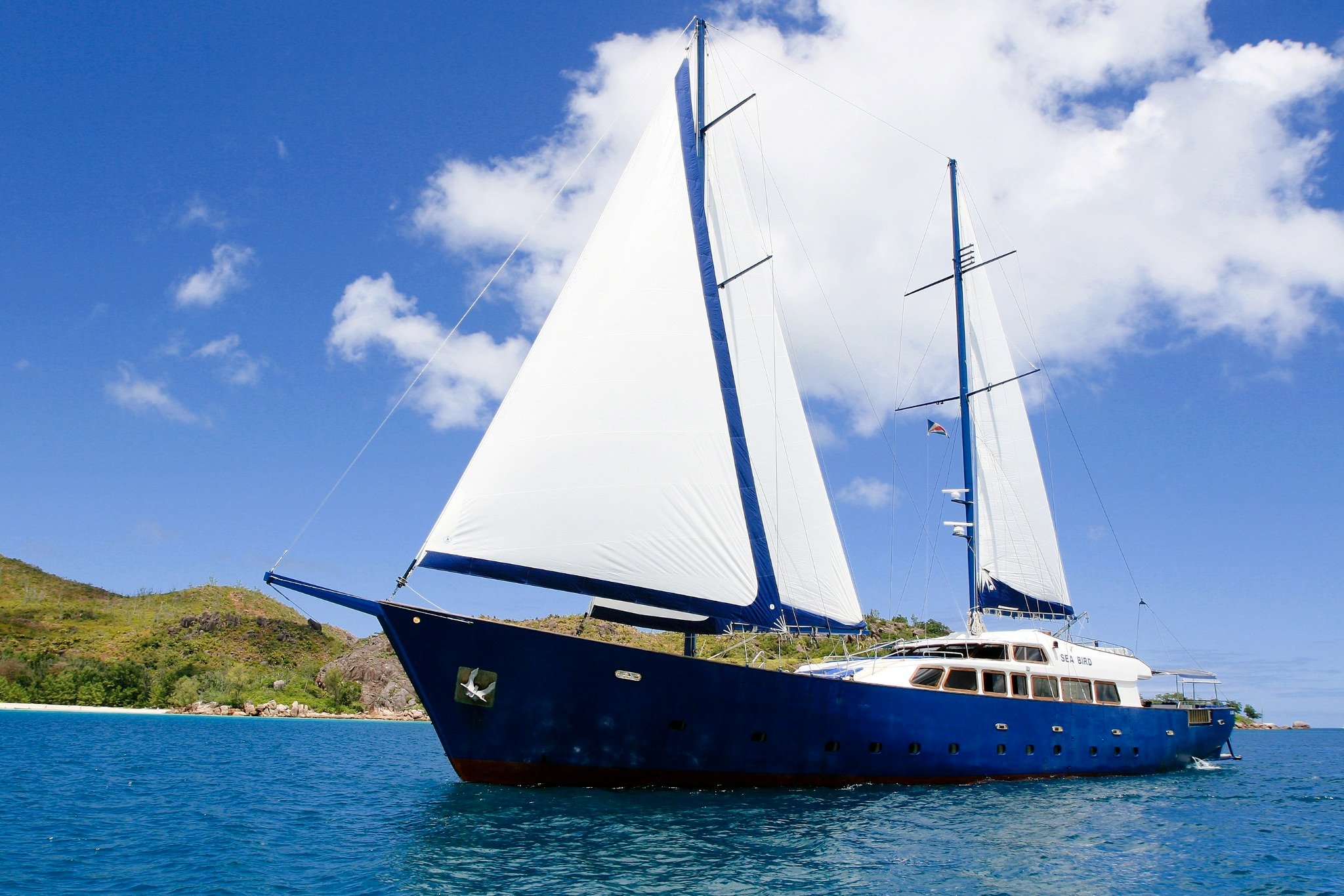 Sea Bird is a charming schooner cruising the Inner Islands of the Seychelles, offering snorkeling, diving, and laid-back sailing amid granite outcrops and turquoise lagoons