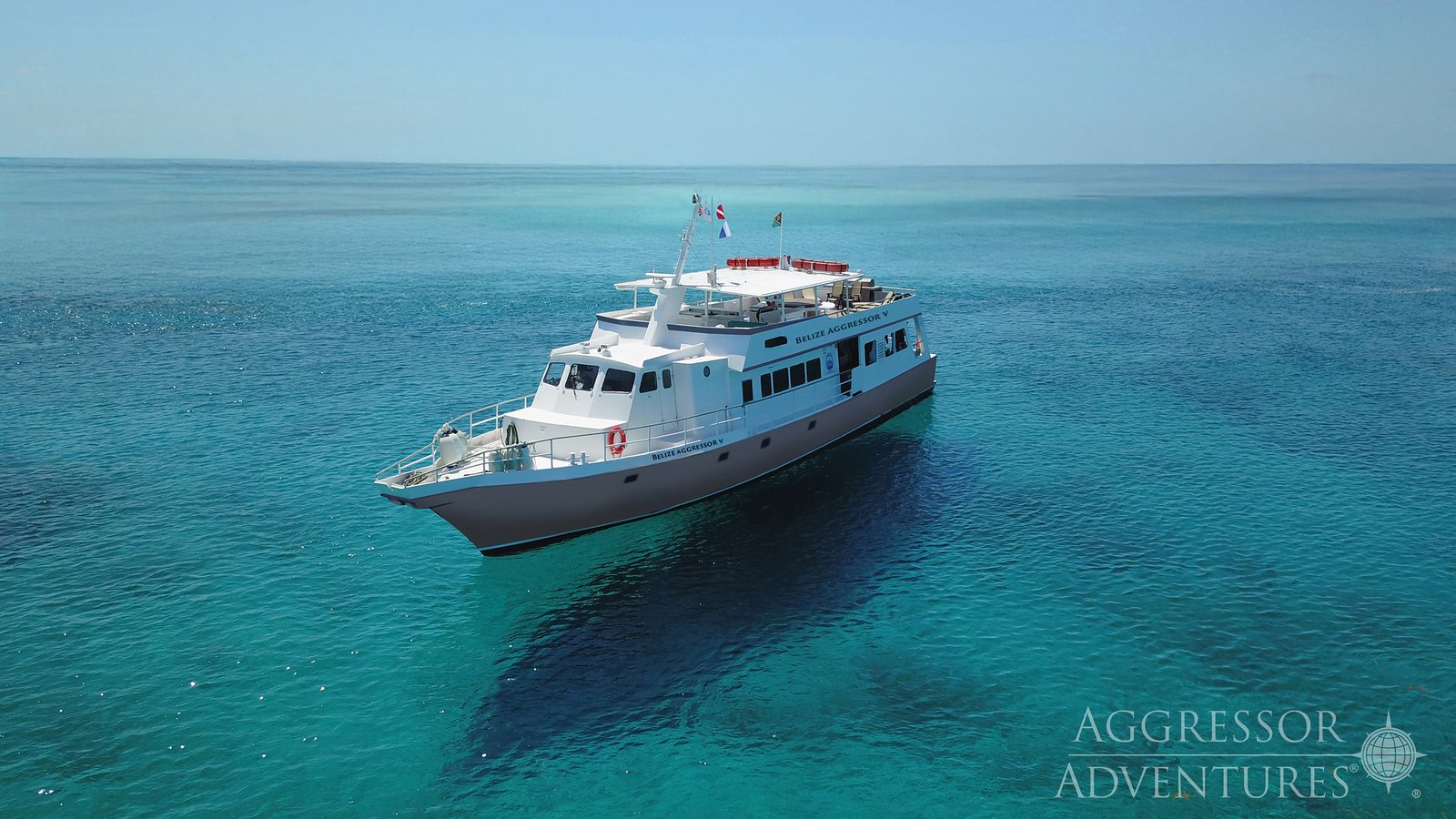 Beliz Aggressor V diving journeys at Glovers Reef and Placencia, where dramatic wall dives meet gentle sloping reefs