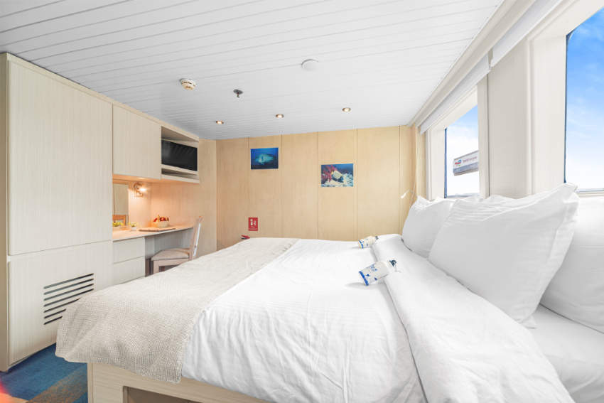 12 En‑Suite Staterooms Across Two Decks